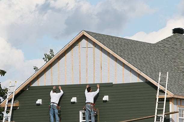 Professional Siding Repair technician working in Lake City, PA